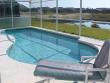 Pool faces south overlooking a lake